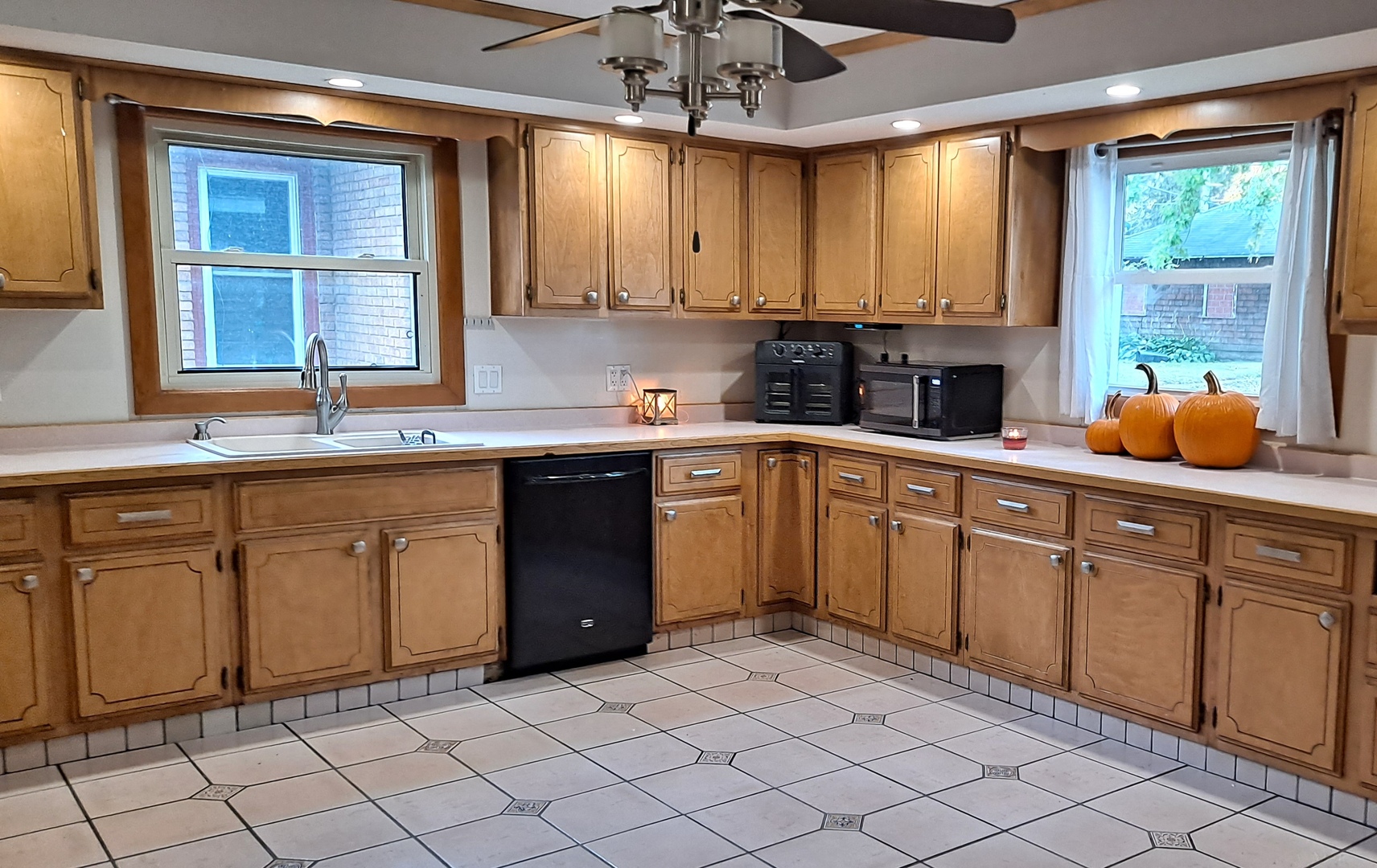 405 West Cleveland Street Spring Valley, IL 61362 - Photo 4 of 21 a kitchen with stainless steel appliances granite countertop a sink and cabinets