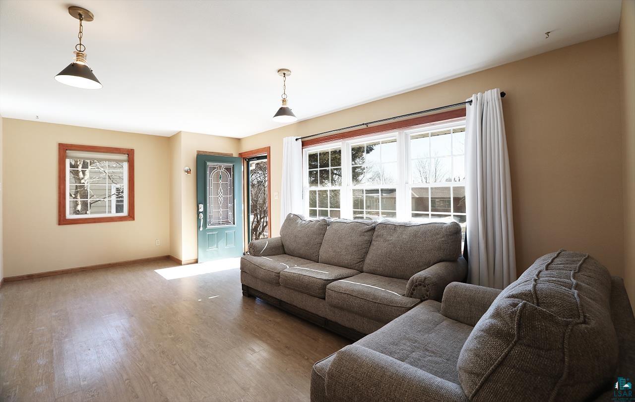 811 7th Street North Virginia, MN 55792 - Photo 2 of 37 Living room with wood finished floors and baseboards