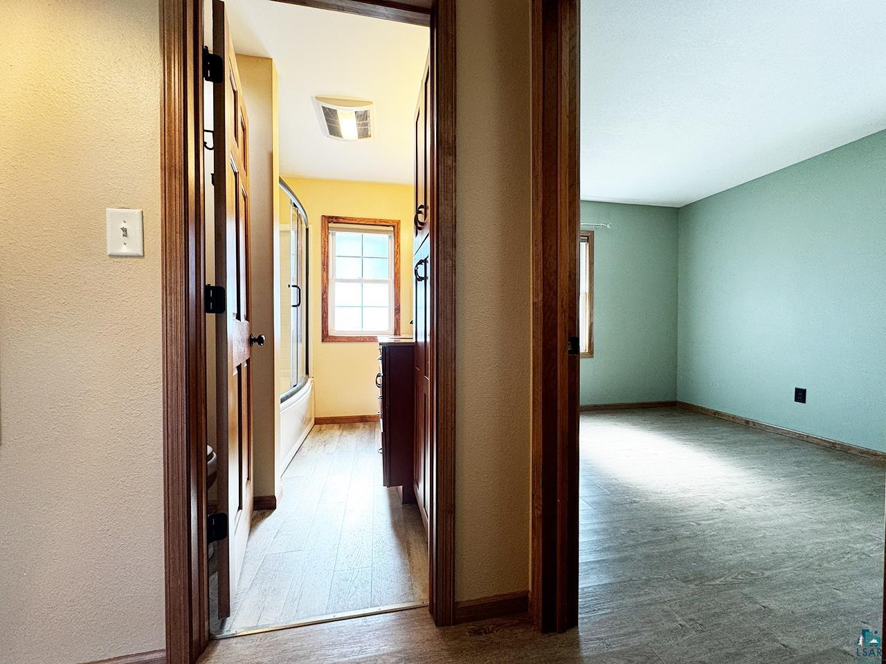 811 7th Street North Virginia, MN 55792 - Photo 21 of 37 Corridor with a textured wall