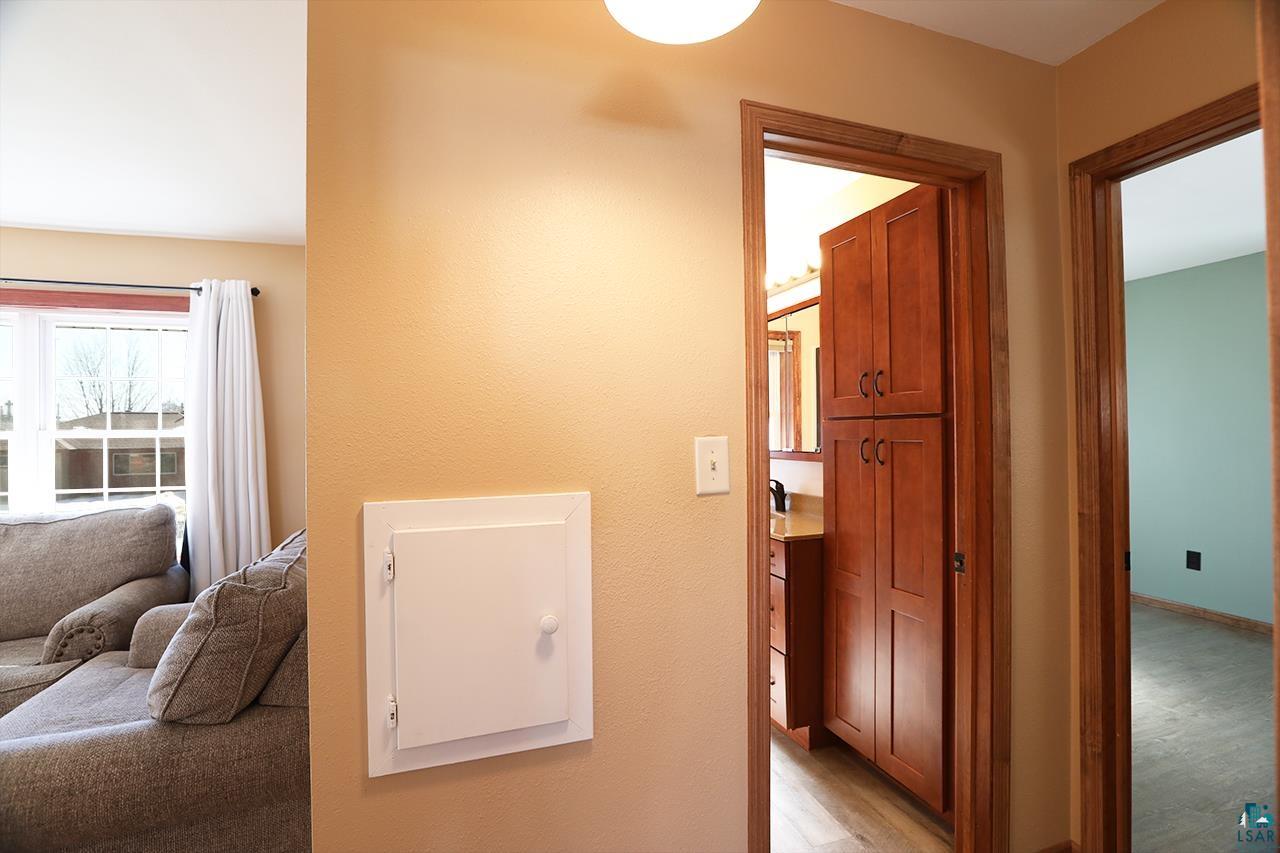 811 7th Street North Virginia, MN 55792 - Photo 24 of 37 Hallway featuring light wood-type flooring