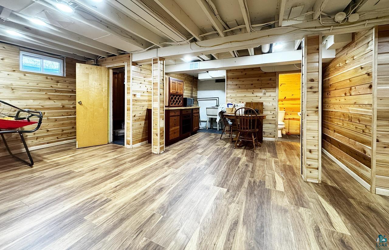 811 7th Street North Virginia, MN 55792 - Photo 27 of 37 Office featuring wooden walls and light wood-style flooring