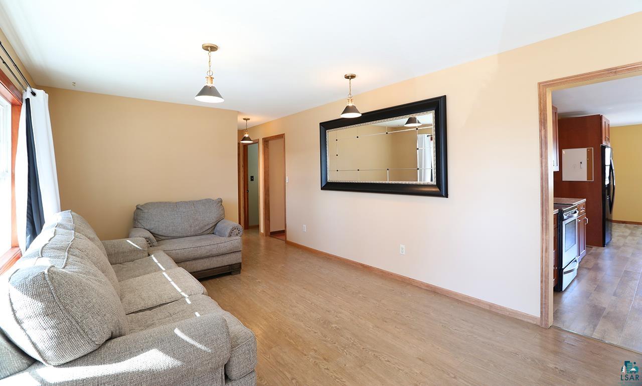 811 7th Street North Virginia, MN 55792 - Photo 4 of 37 Living area with light wood-style floors