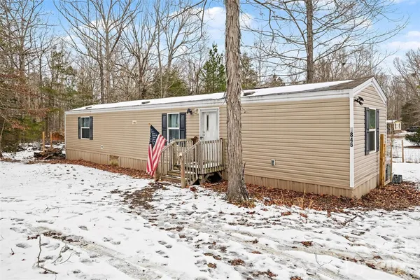 a view of a backyard of a house