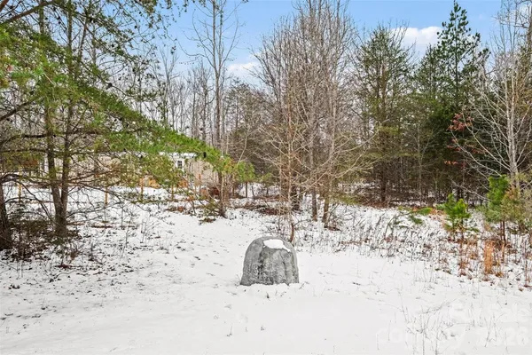 a view of snow on the road