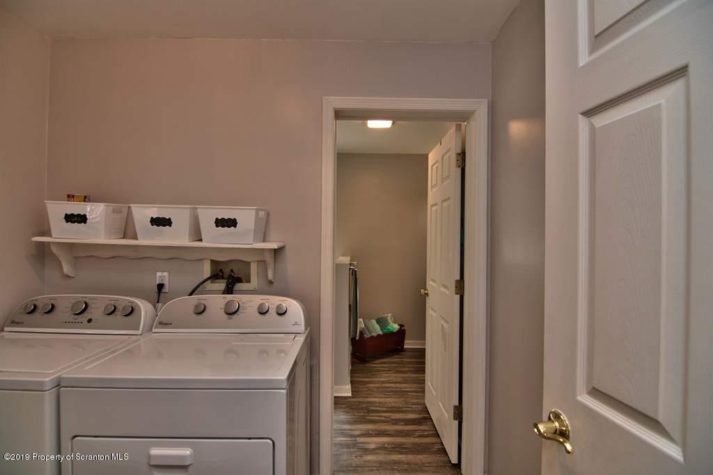 212 Summit Woods Road Moscow, PA 18444 - Photo 35 of 68 a utility room with dryer and washer