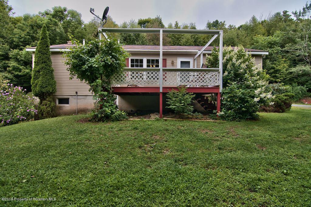 212 Summit Woods Road Moscow, PA 18444 - Photo 59 of 68 a view of front of house with a yard