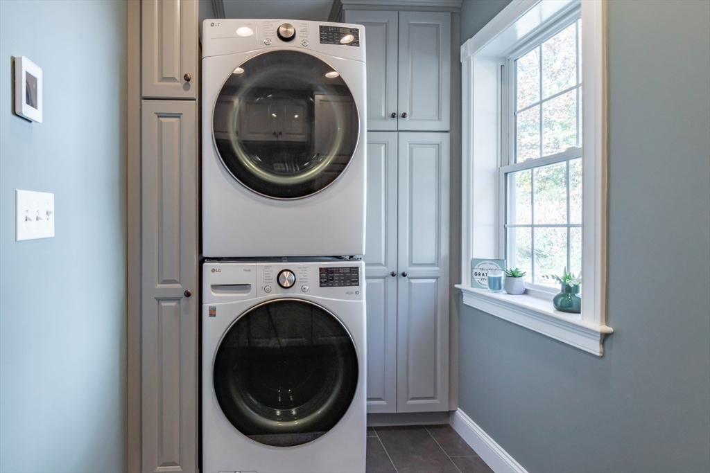 46 Rocky Pond Road Brookline, NH 03033 - Photo 18 of 41 a utility room with dryer and washer