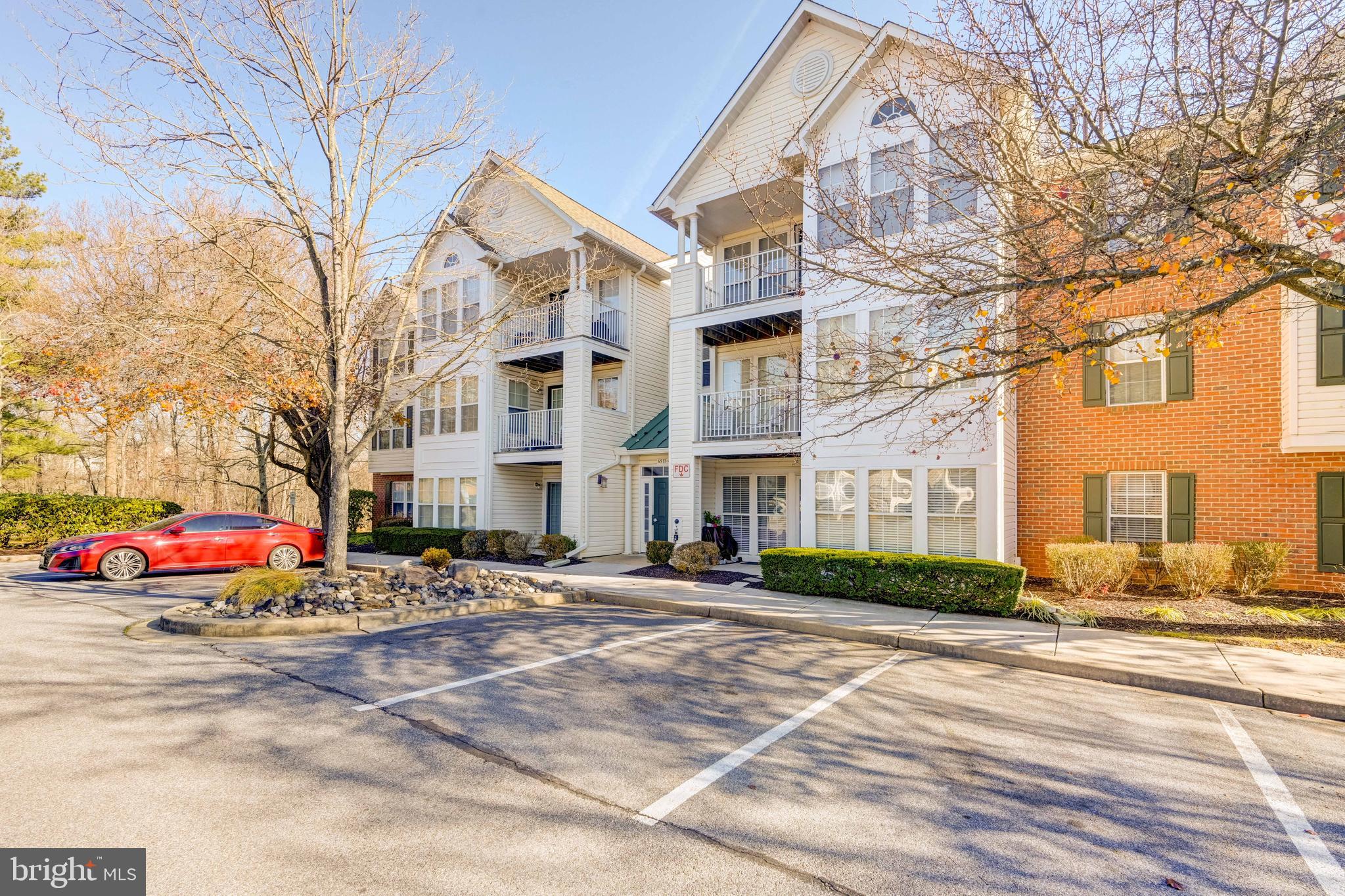 a front view of a building with street view