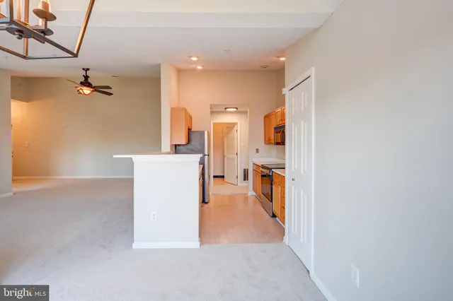 a view of a kitchen with a sink