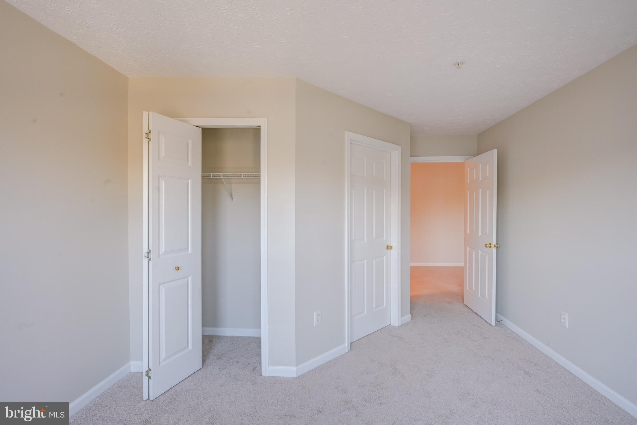 4933 Riders Court, Unit 4933 Owings Mills, MD 21117 - Photo 24 of 32 a view of an empty room