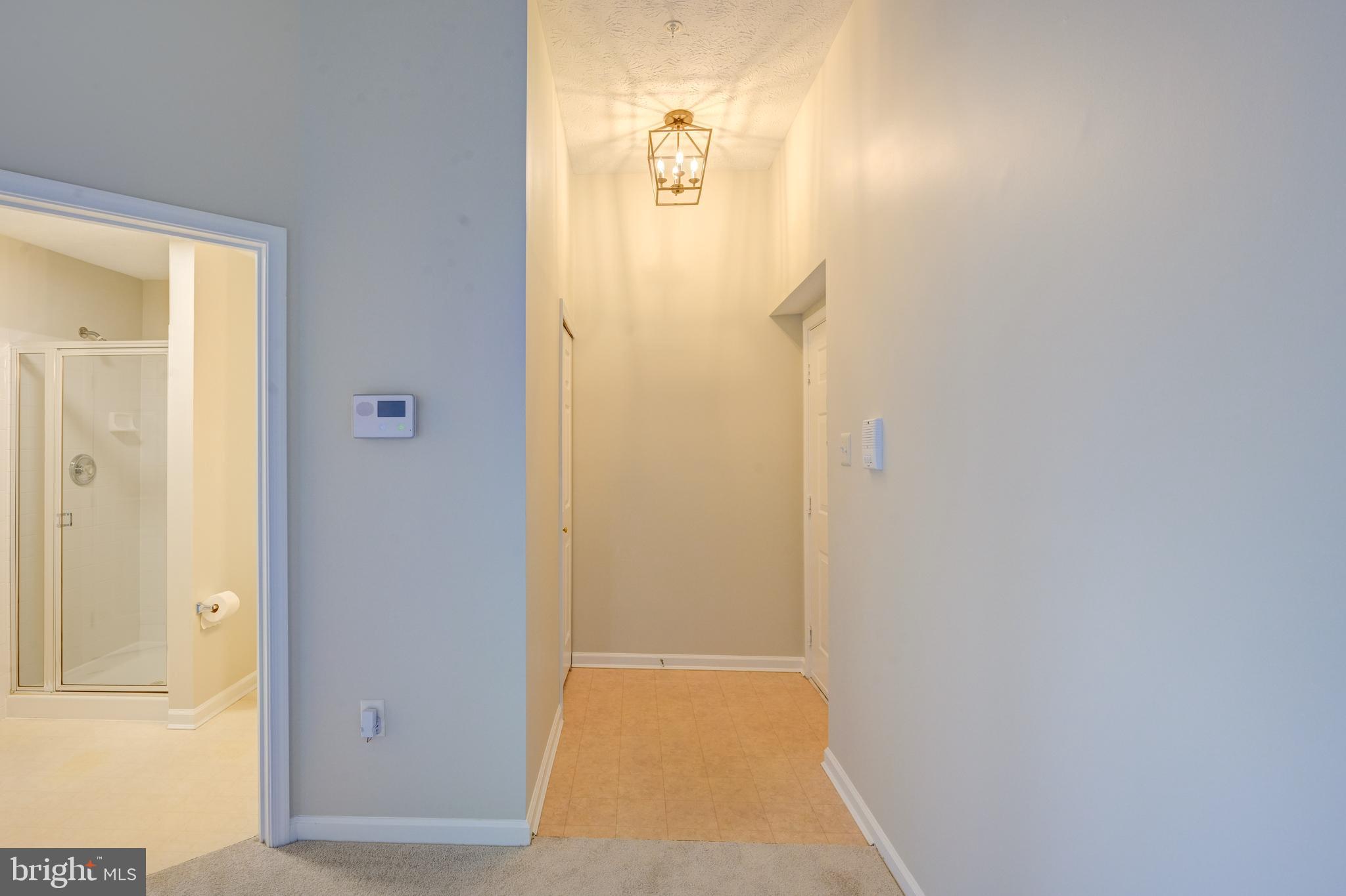 4933 Riders Court, Unit 4933 Owings Mills, MD 21117 - Photo 32 of 32 view of a bathroom with door
