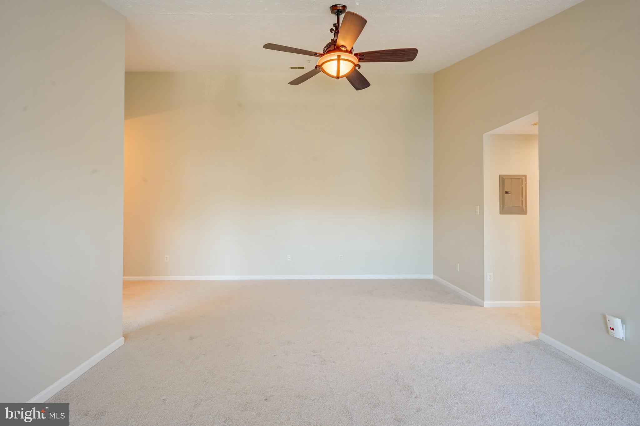 4933 Riders Court, Unit 4933 Owings Mills, MD 21117 - Photo 8 of 32 a view of an empty room