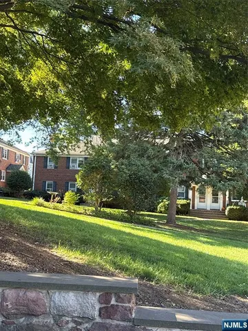a garden view with a sitting space