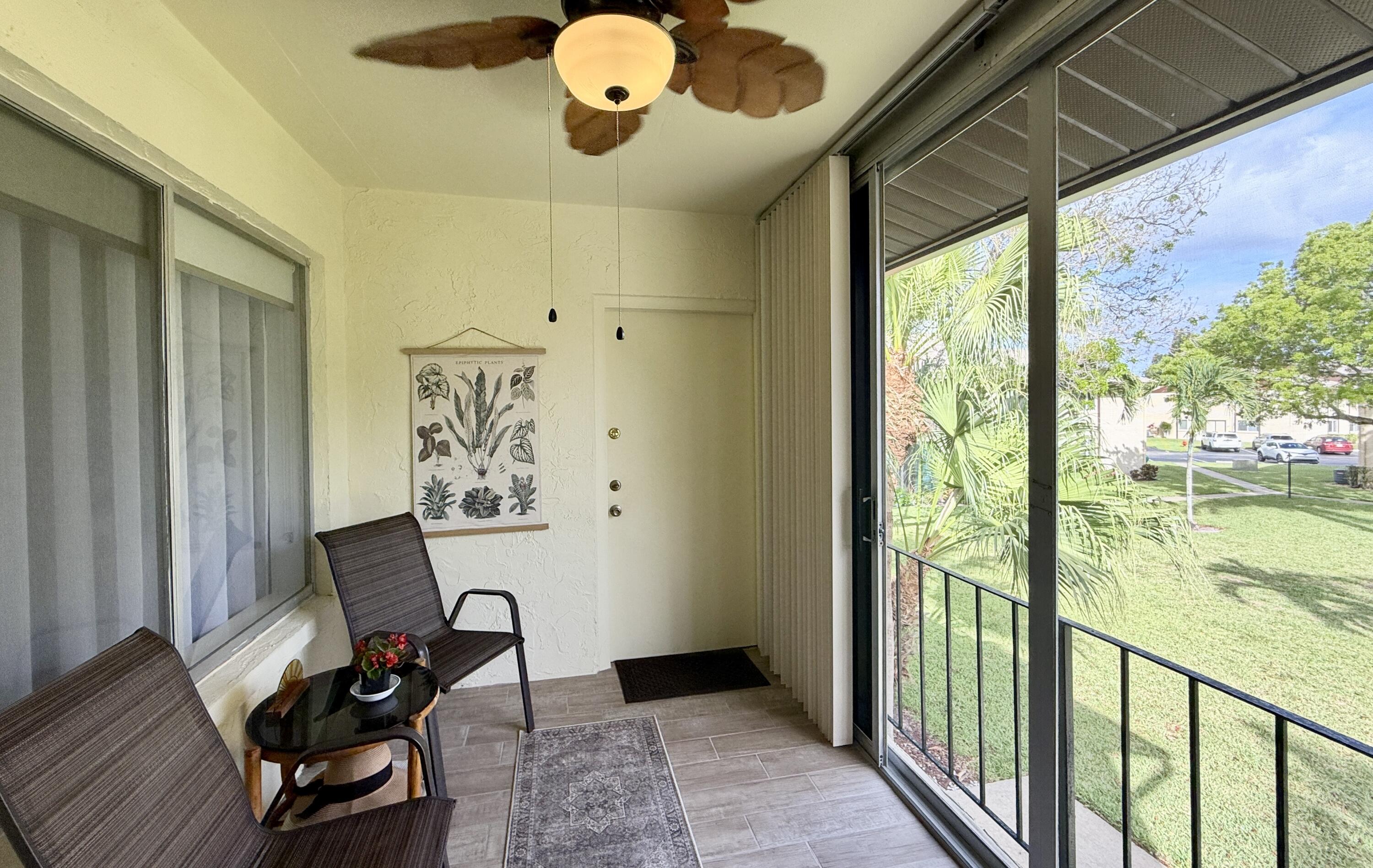 301 Pine Ridge Circle, Unit C2 Greenacres, FL 33463 - Photo 16 of 28 Florida room