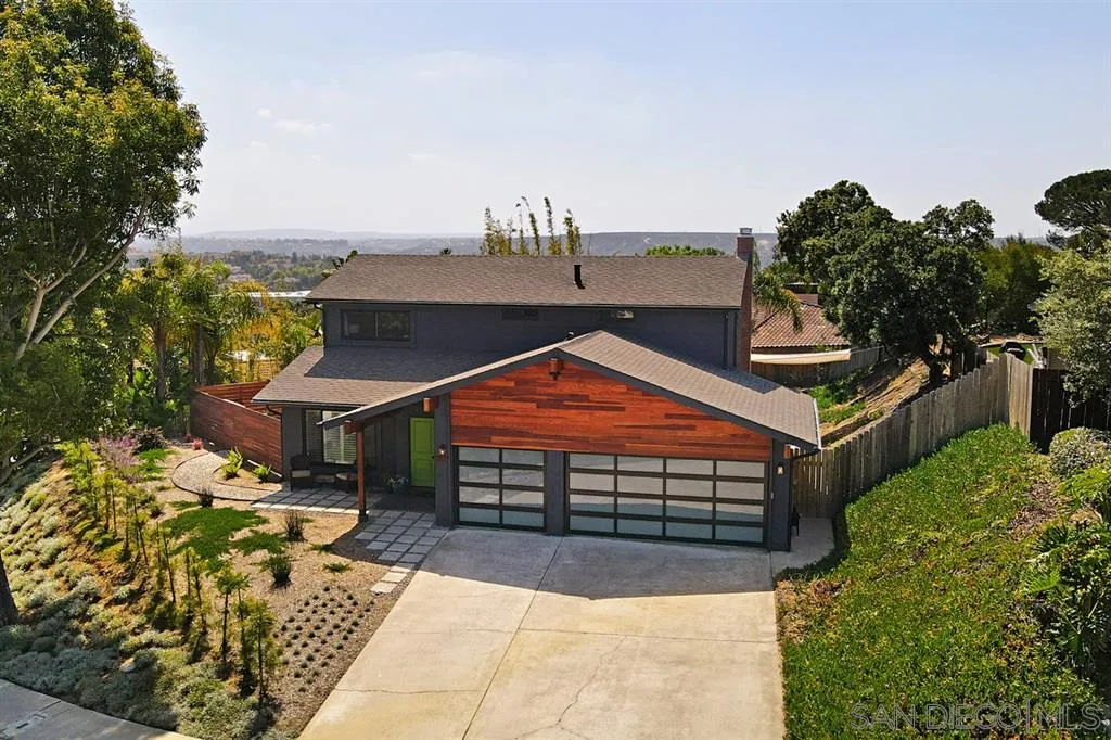 a view of a swimming pool with an outdoor seating