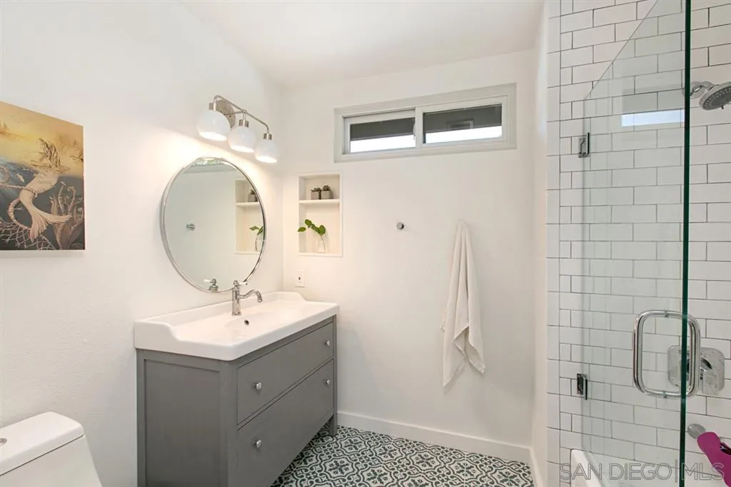 13637 Calais Drive Del Mar, CA 92014 - Photo 18 of 25 a bathroom with a sink a toilet and shower