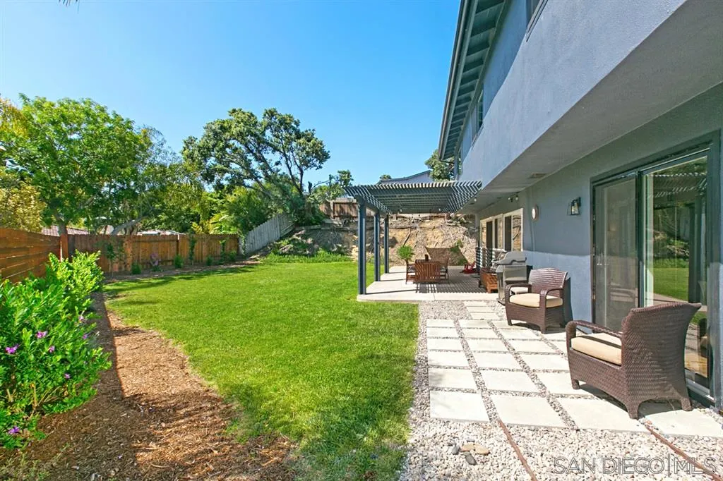 13637 Calais Drive Del Mar, CA 92014 - Photo 24 of 25 a view of a patio with couches table and chairs and potted plants