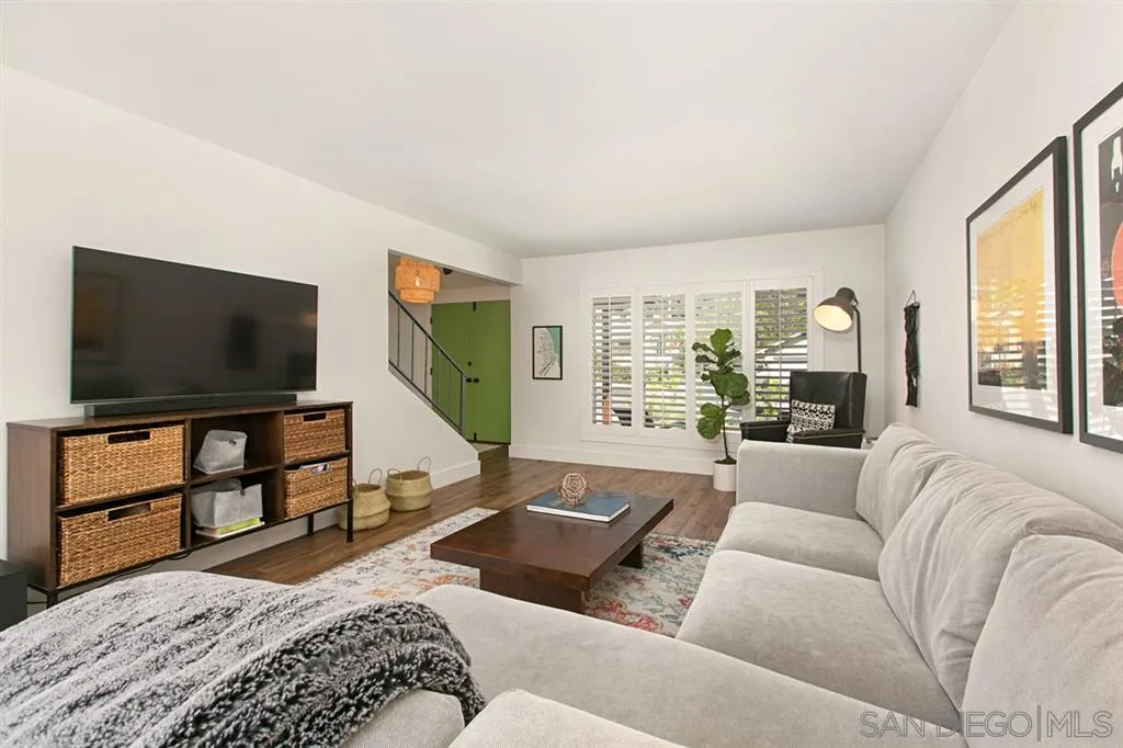13637 Calais Drive Del Mar, CA 92014 - Photo 6 of 25 a spacious bedroom with a large bed and a flat screen tv