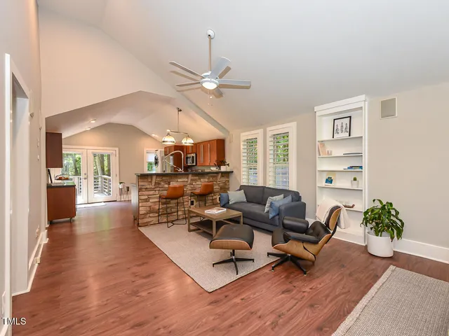 a kitchen with stainless steel appliances a stove a sink and a refrigerator