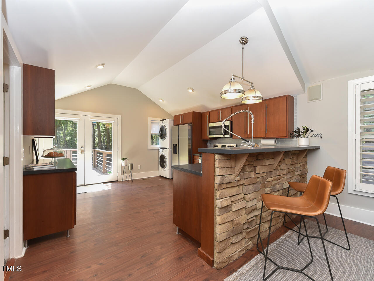3223 Tryon Road Raleigh, NC 27603 - Photo 17 of 45 a kitchen with a table and chairs in it