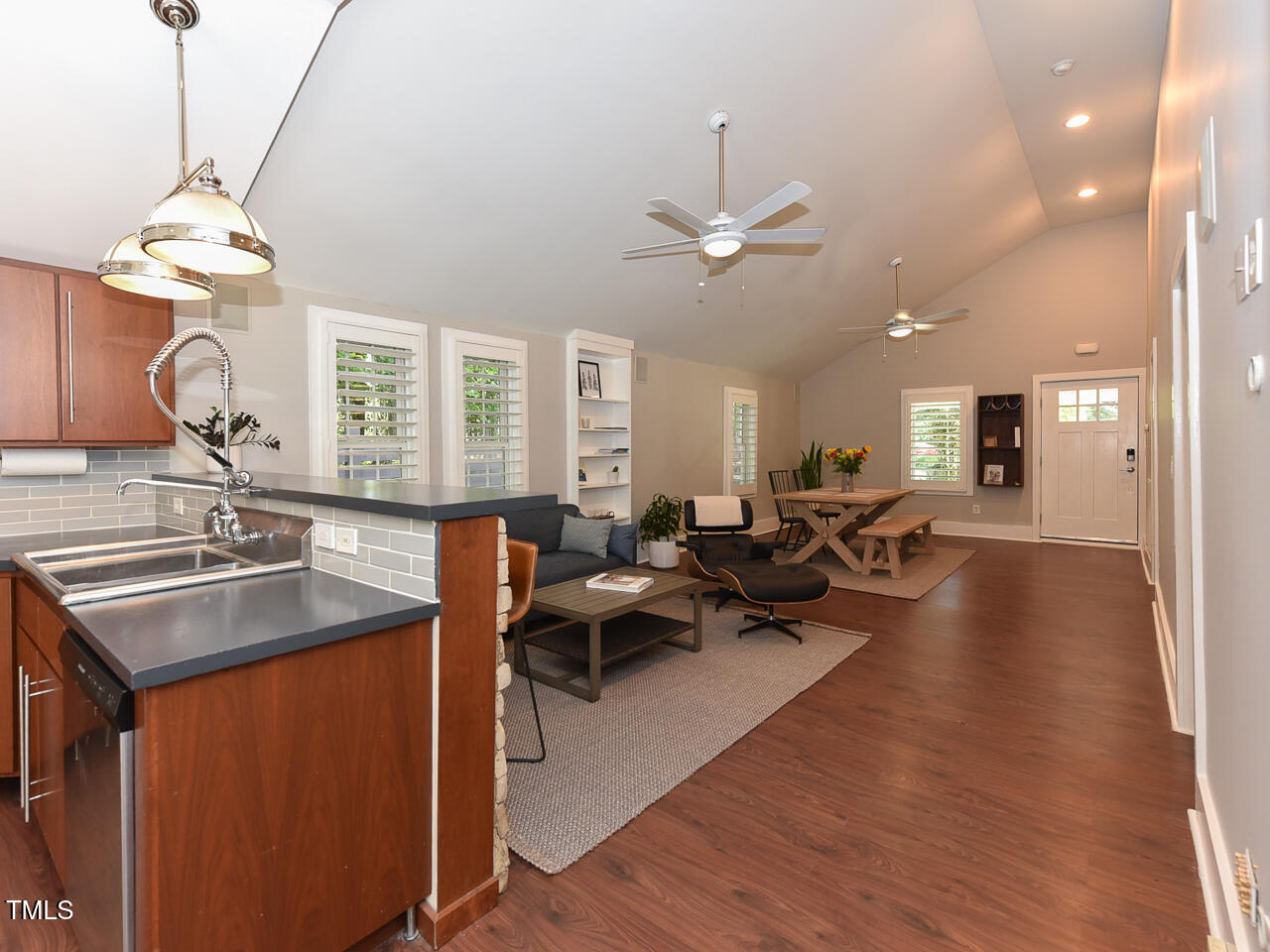 3223 Tryon Road Raleigh, NC 27603 - Photo 18 of 45 a large room with lots of furniture and chandelier