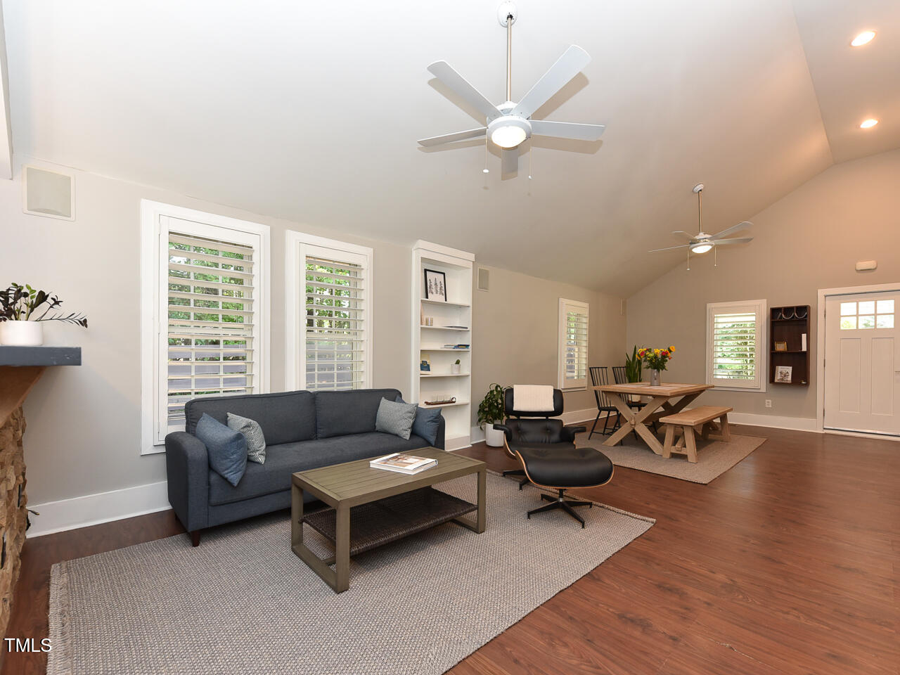 3223 Tryon Road Raleigh, NC 27603 - Photo 20 of 45 a living room with furniture and wooden floor