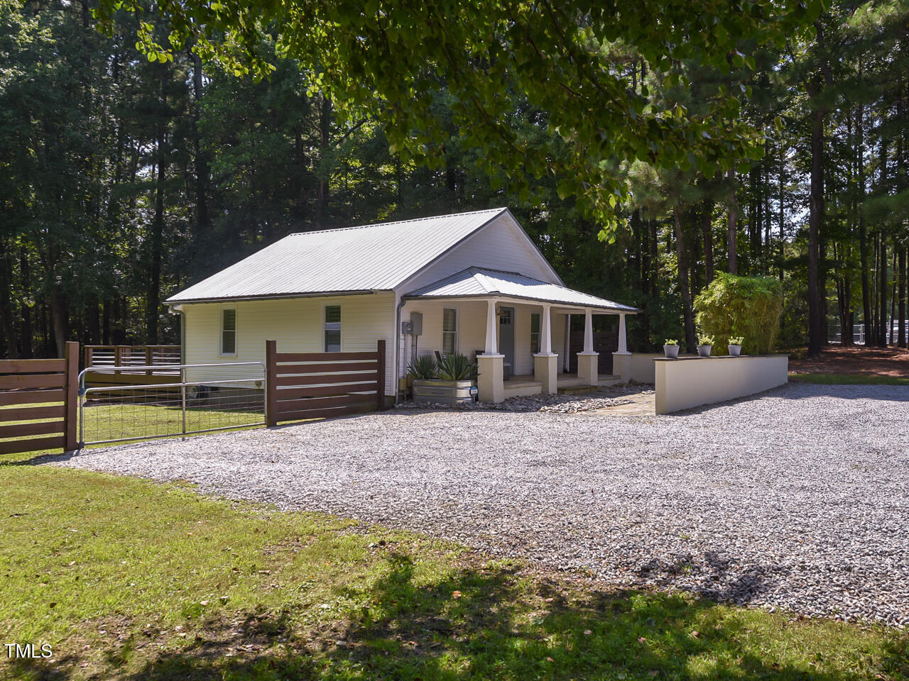 3223 Tryon Road Raleigh, NC 27603 - Photo 2 of 45 a house with swimming pool in front of it
