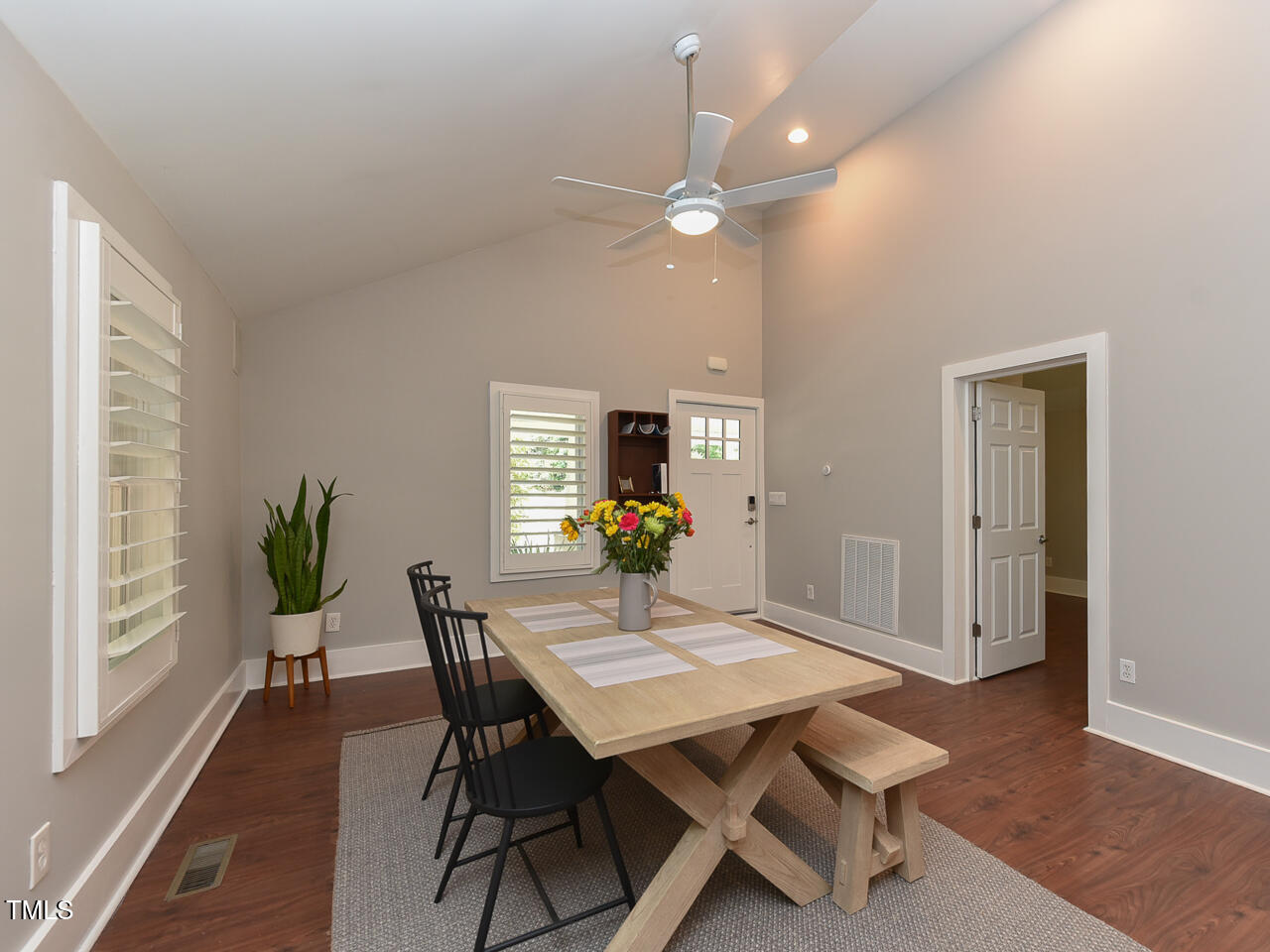 3223 Tryon Road Raleigh, NC 27603 - Photo 22 of 45 a view of a dining room with furniture and wooden floor