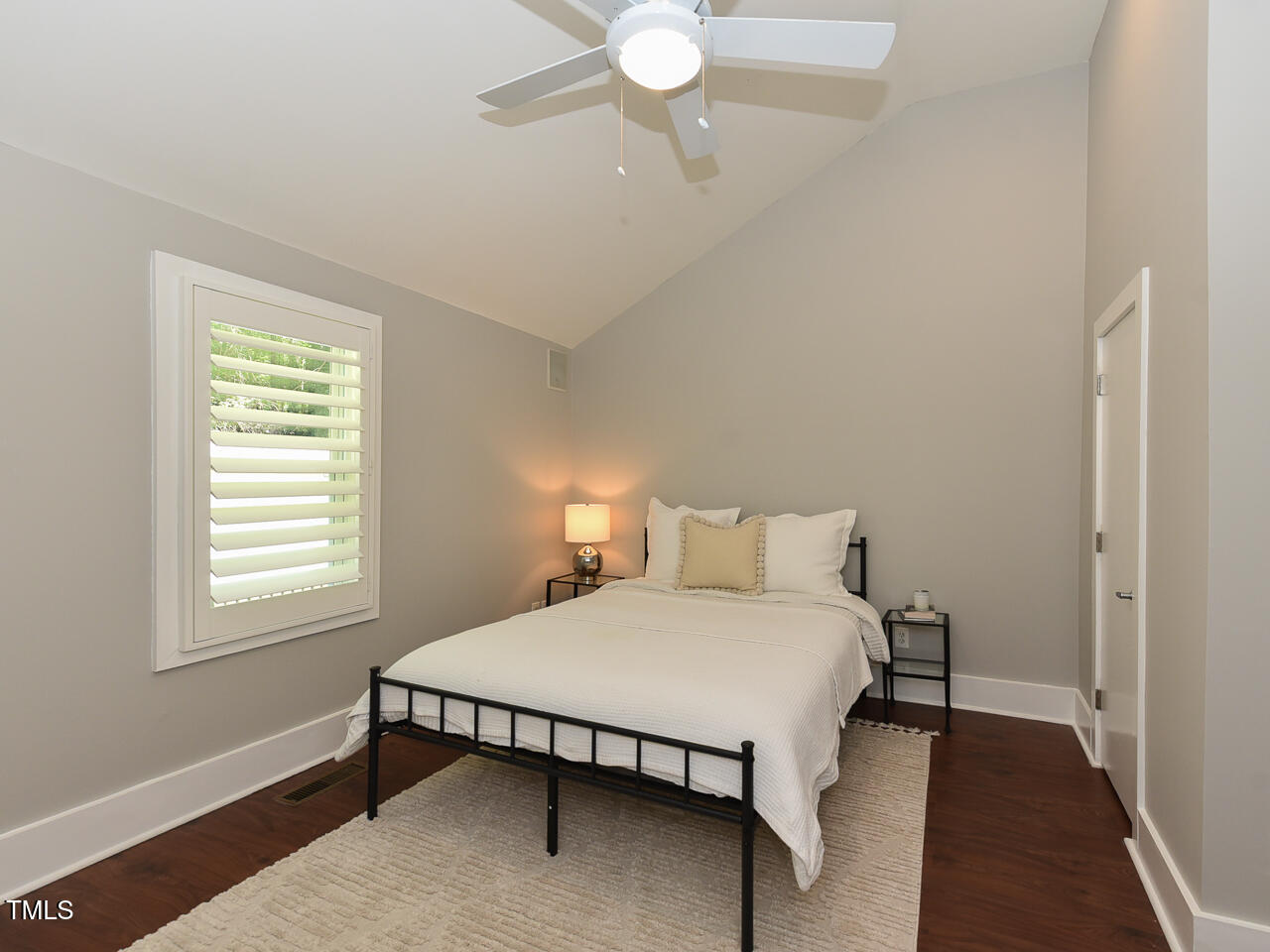 3223 Tryon Road Raleigh, NC 27603 - Photo 25 of 45 a bedroom with a bed and window