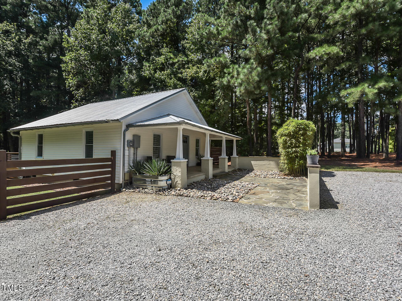 3223 Tryon Road Raleigh, NC 27603 - Photo 3 of 45 a front view of a house with garden