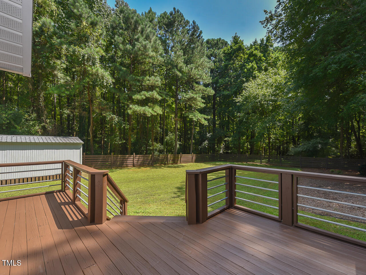 3223 Tryon Road Raleigh, NC 27603 - Photo 31 of 45 a view of outdoor space with deck and yard