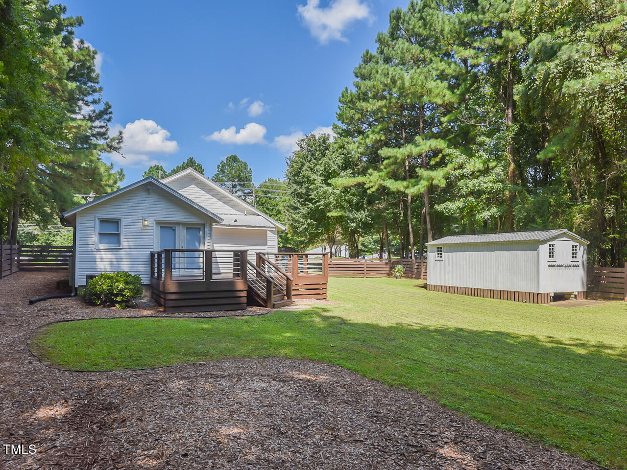 3223 Tryon Road Raleigh, NC 27603 - Photo 40 of 45 a front view of house with yard and green space