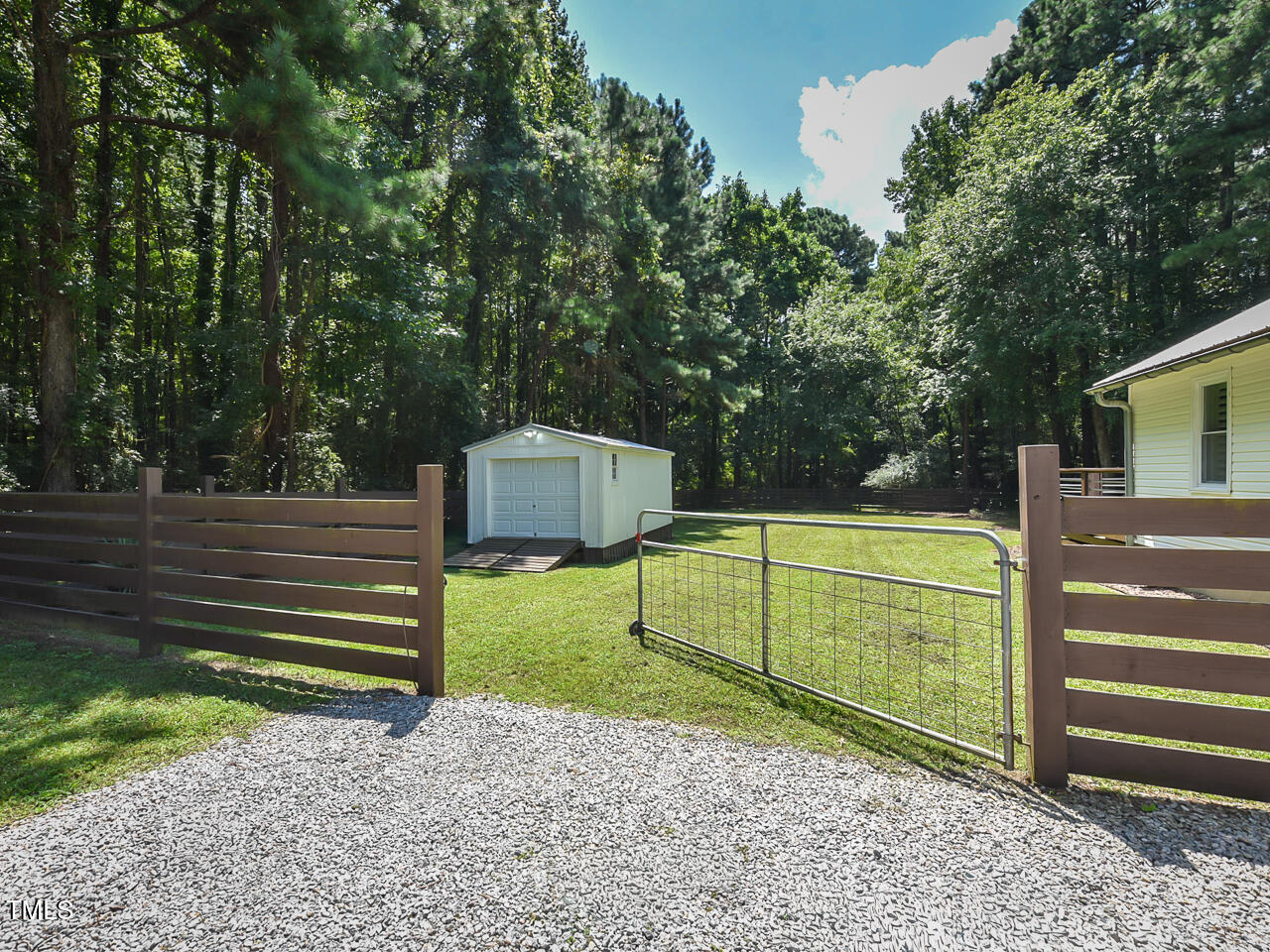 3223 Tryon Road Raleigh, NC 27603 - Photo 7 of 45 a view of a backyard