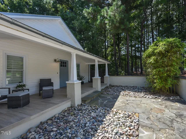a outdoor living space with furniture and garden view