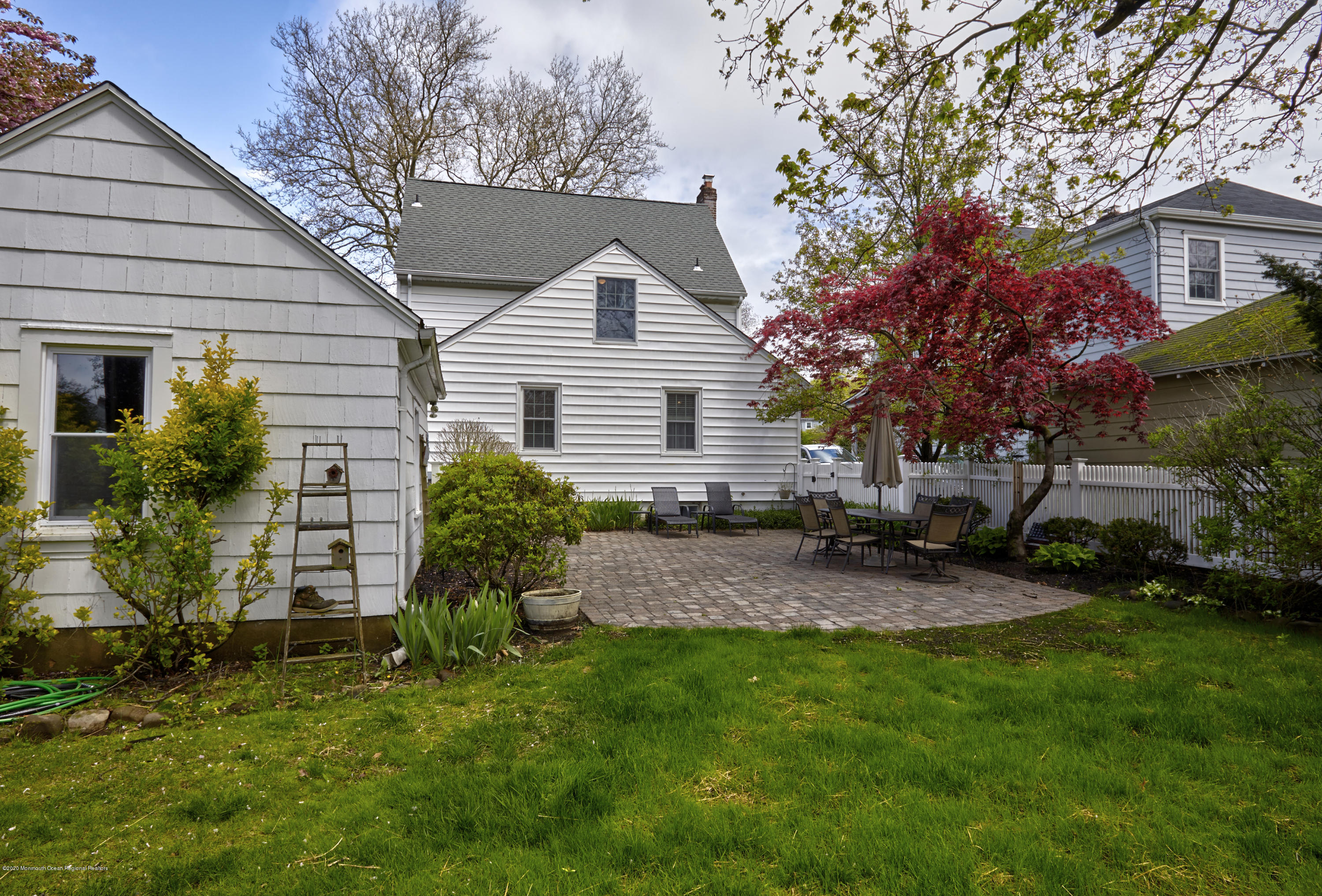 187 Pinckney Road Little Silver, NJ 07739 - Photo 7 of 37 a view of a house with a yard and sitting area