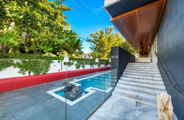 a view of a backyard with plants