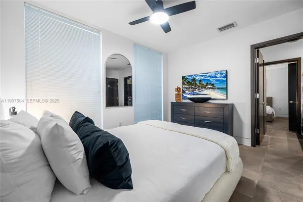 a bathroom with a tub and sink