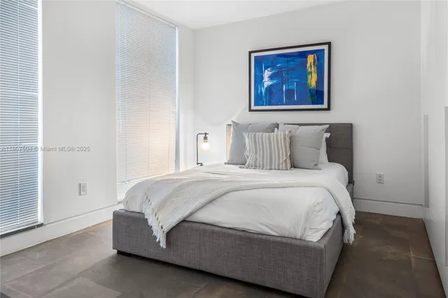 a white tub sitting in a bathroom