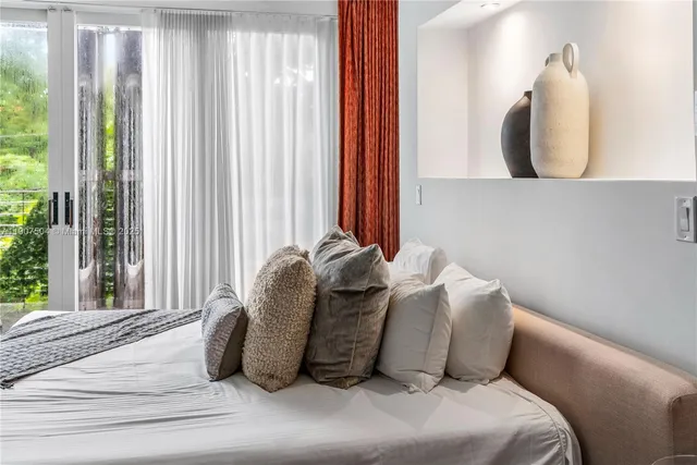 a white bath tub sitting in a bathroom