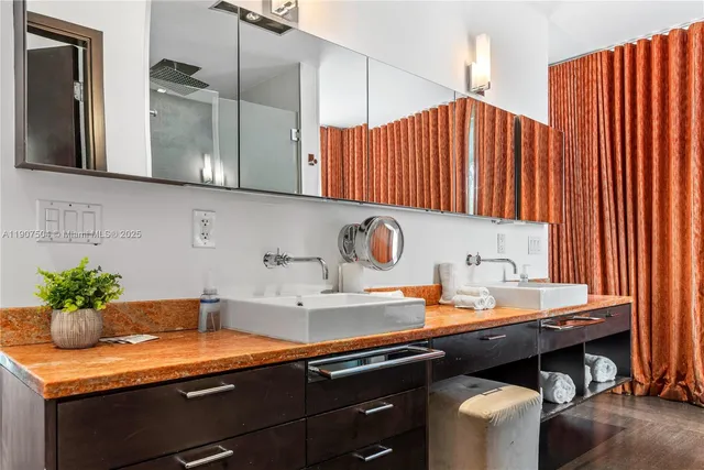 a view of a backyard with table and chairs and couches