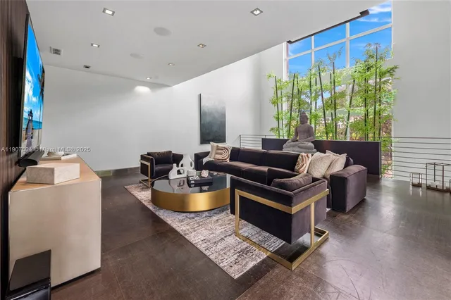 a kitchen with granite countertop a stove and cabinets