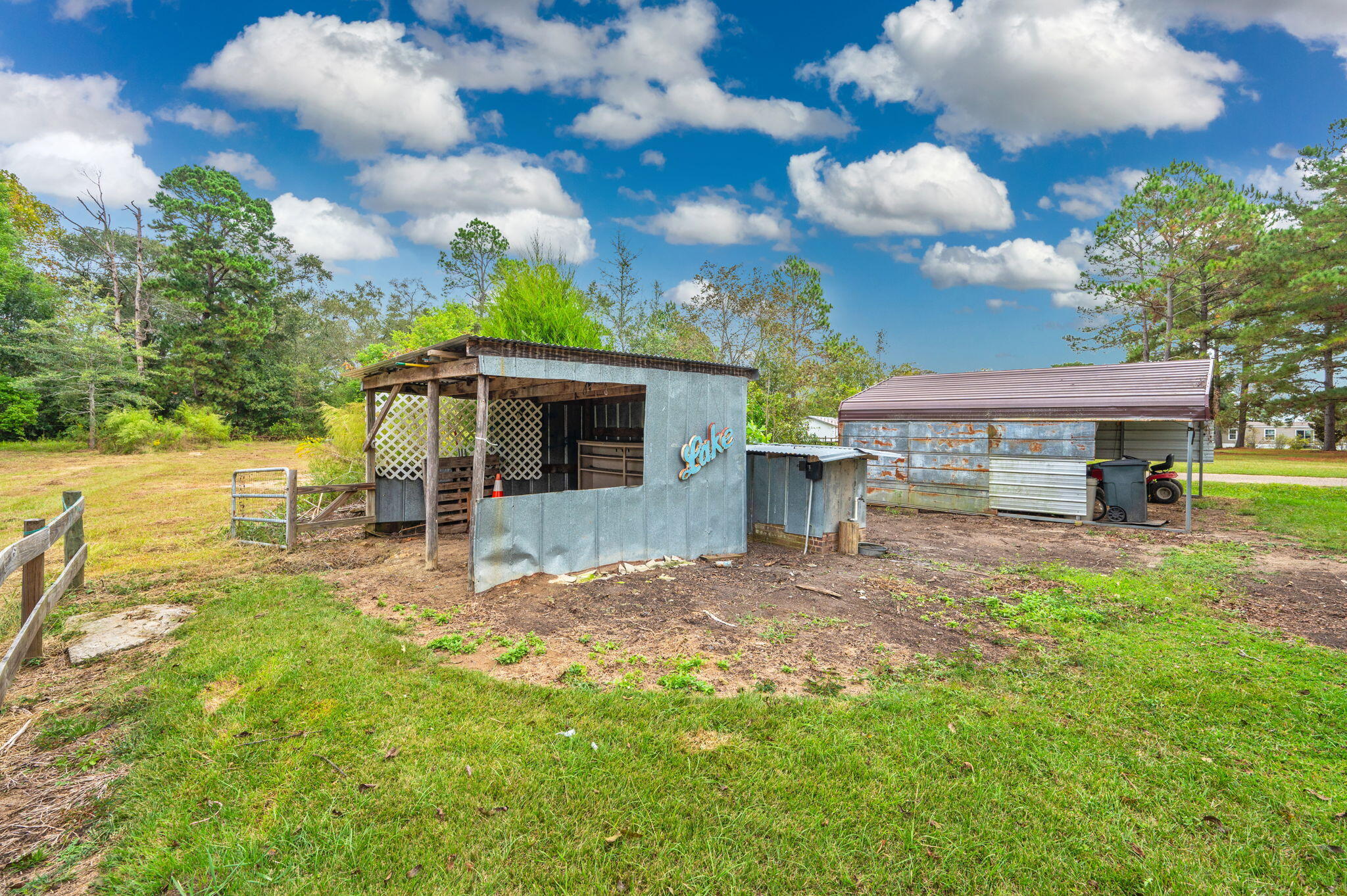 91 North Street DeFuniak Springs, FL 32433 - Photo 43 of 55 a view of a house with backyard and sitting area