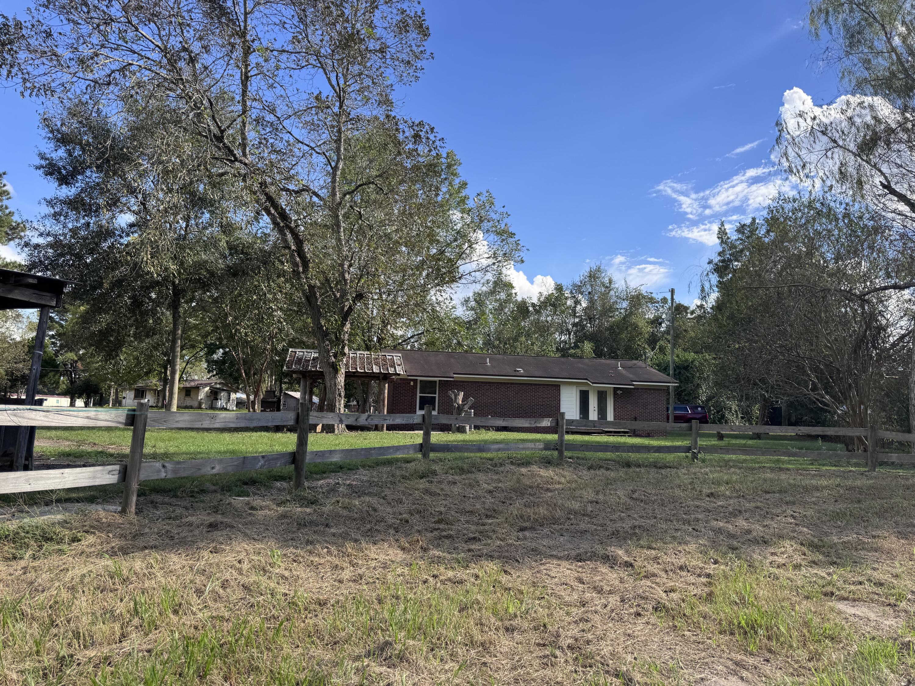 91 North Street DeFuniak Springs, FL 32433 - Photo 44 of 55 a view of a house with a yard