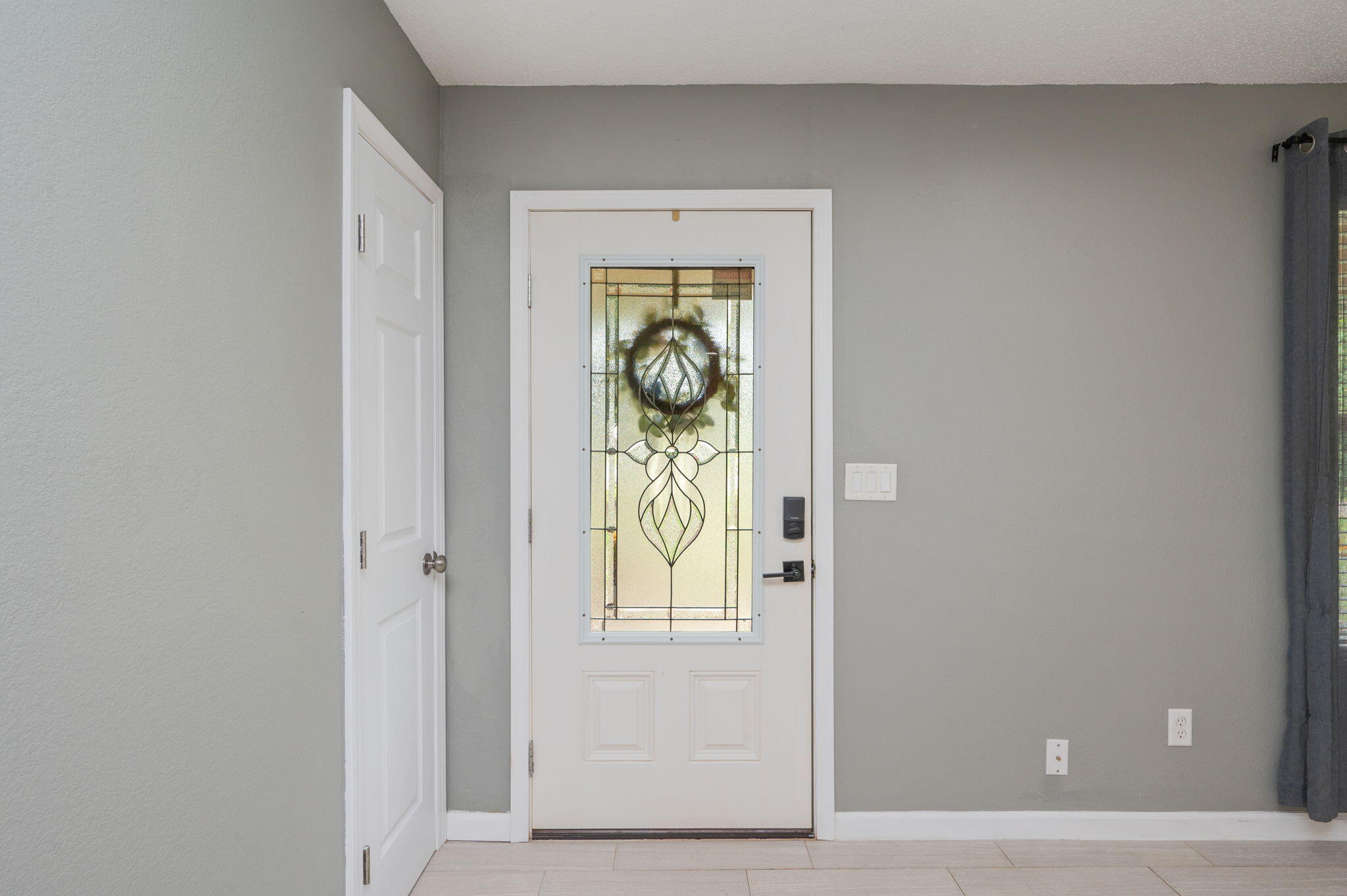 91 North Street DeFuniak Springs, FL 32433 - Photo 9 of 55 a view of a entryway door with wooden floor
