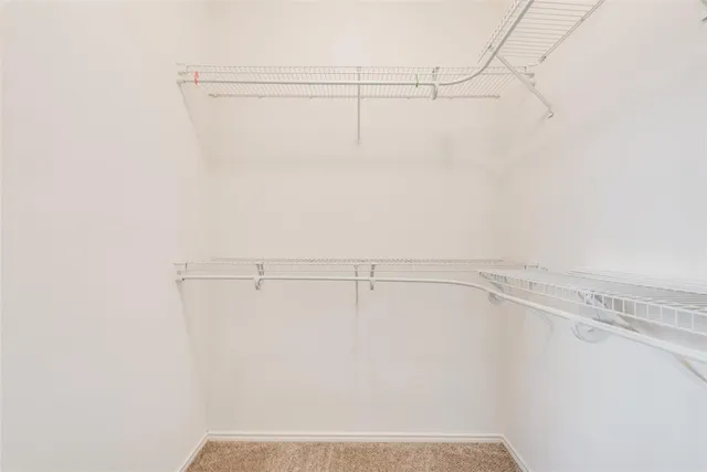 a bathroom with a tub a sink shower and a mirror