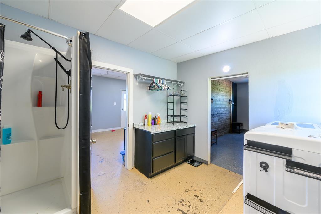 383 Soaring Eagle Trail Wichita Falls, TX 76310 - Photo 25 of 36 Laundry Room and Bathroom in the Barndominium