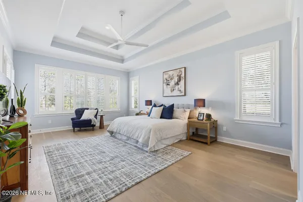 a bed room with bed and a window