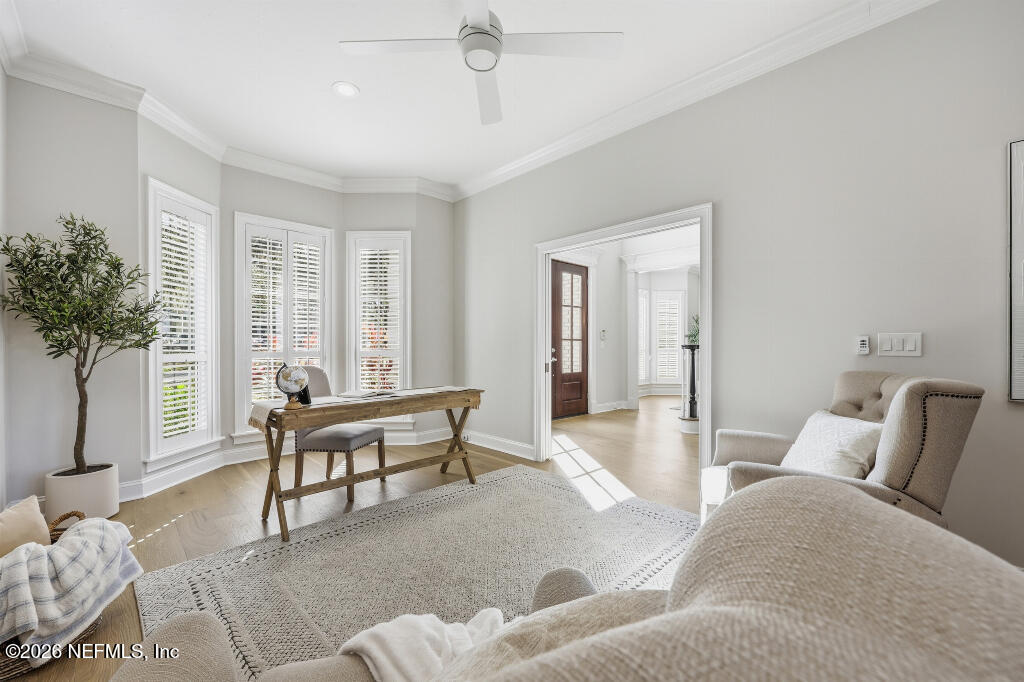7956 Hollyridge Road Jacksonville, FL 32256 - Photo 30 of 50 a living room with furniture and a large window