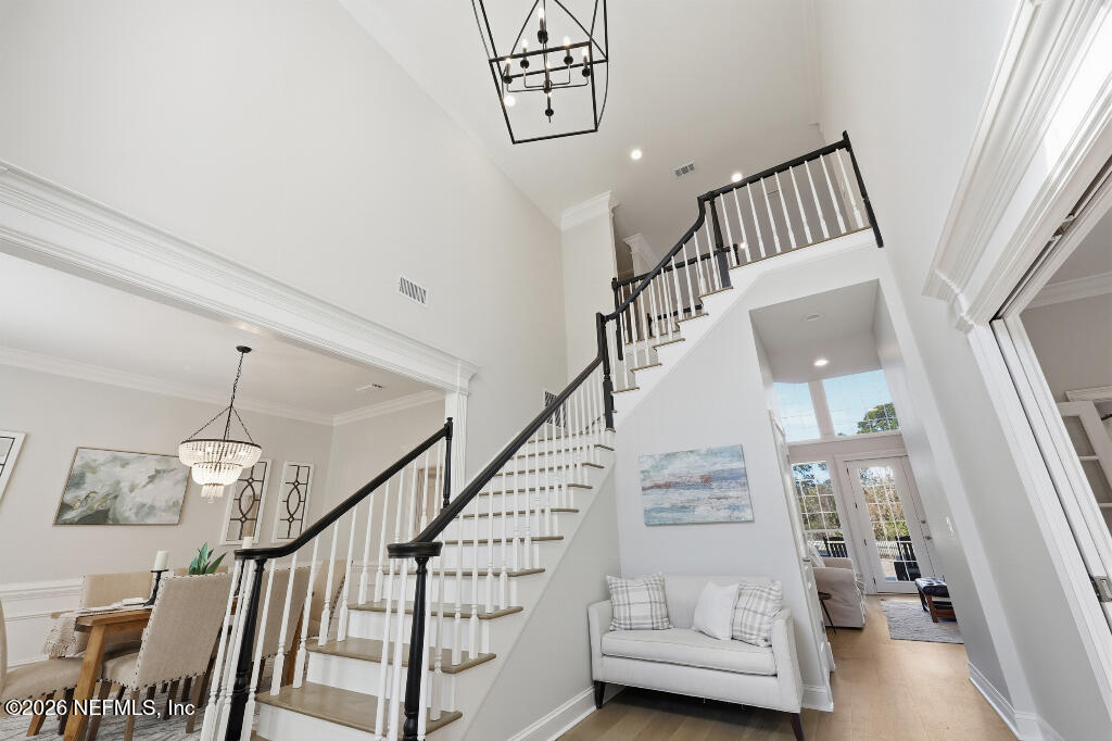 7956 Hollyridge Road Jacksonville, FL 32256 - Photo 31 of 50 a view of entryway and hall with wooden floor