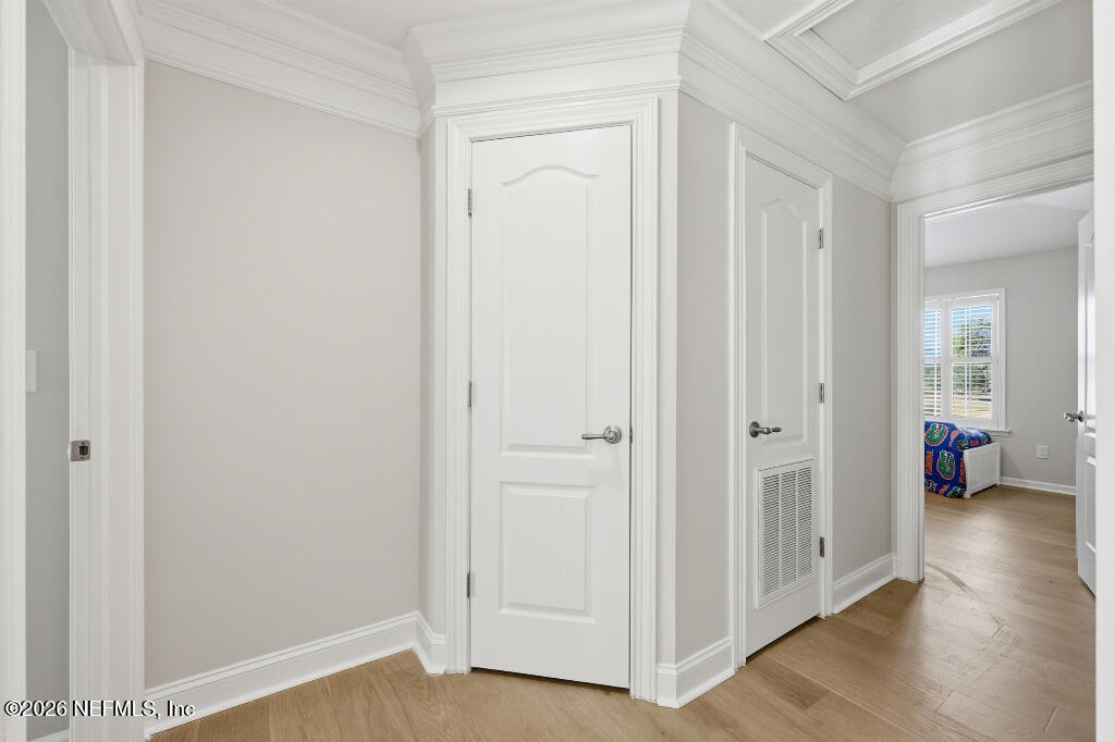 7956 Hollyridge Road Jacksonville, FL 32256 - Photo 35 of 50 a view of an empty room and wooden floor